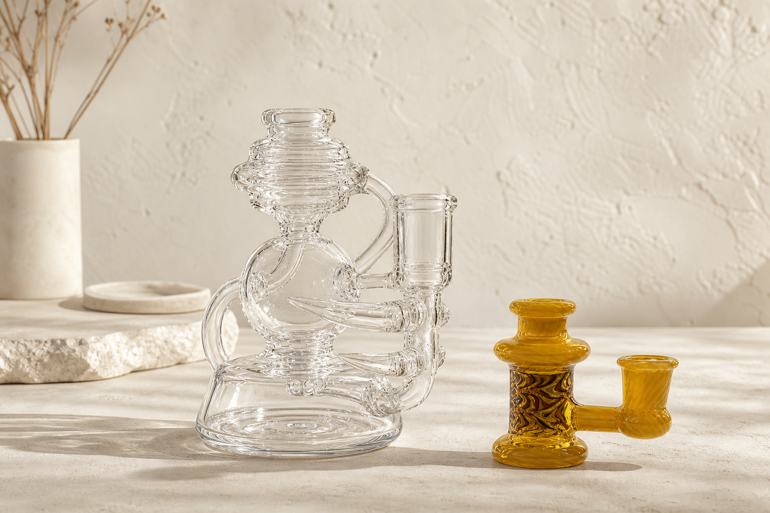 Clear and amber hand-blown glass arranged in Wyatt Bouchard's daylight studio
