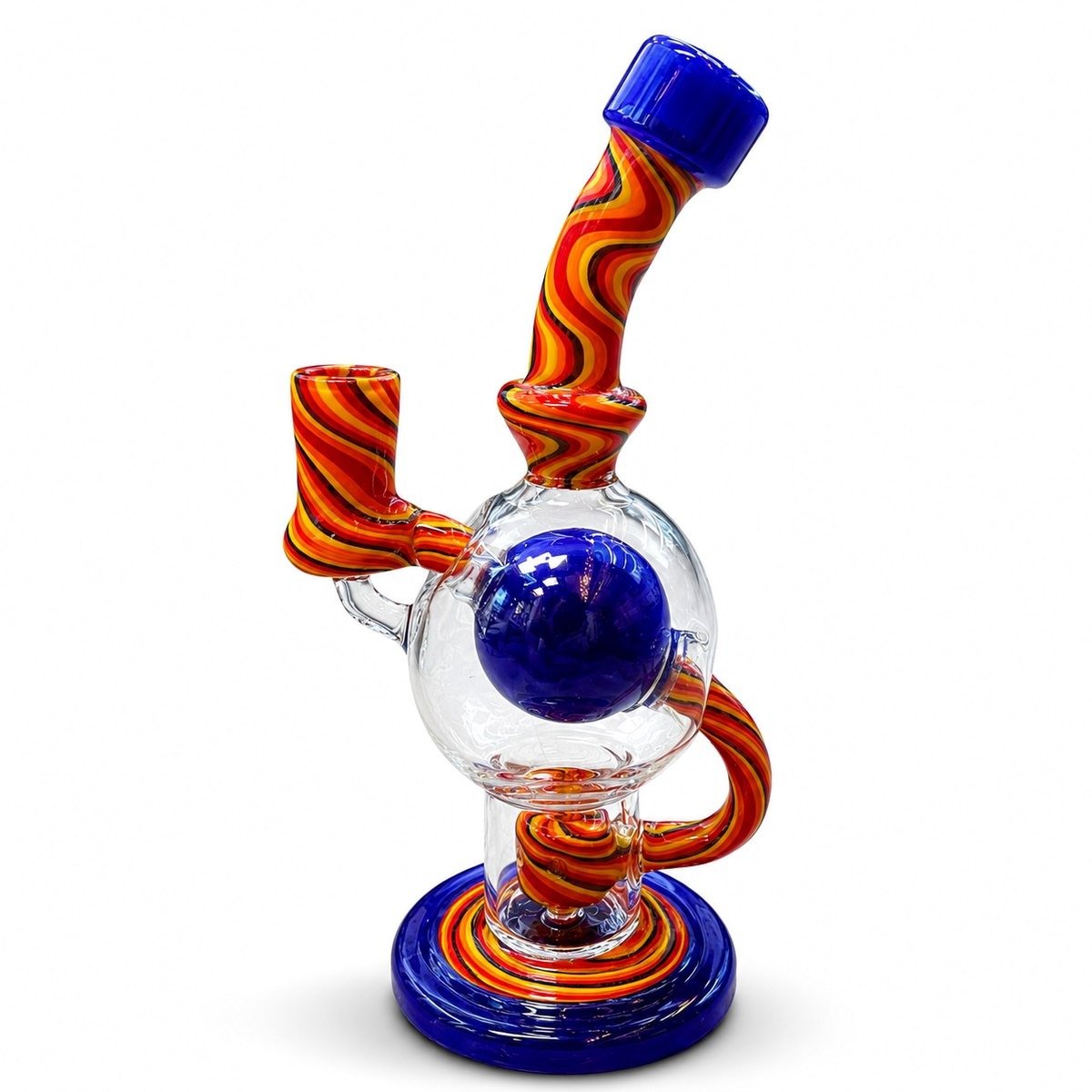 Blue Core Recycler, a hand-blown recycler water pipe wrapped in red and orange cane with a solid cobalt sphere at its core
