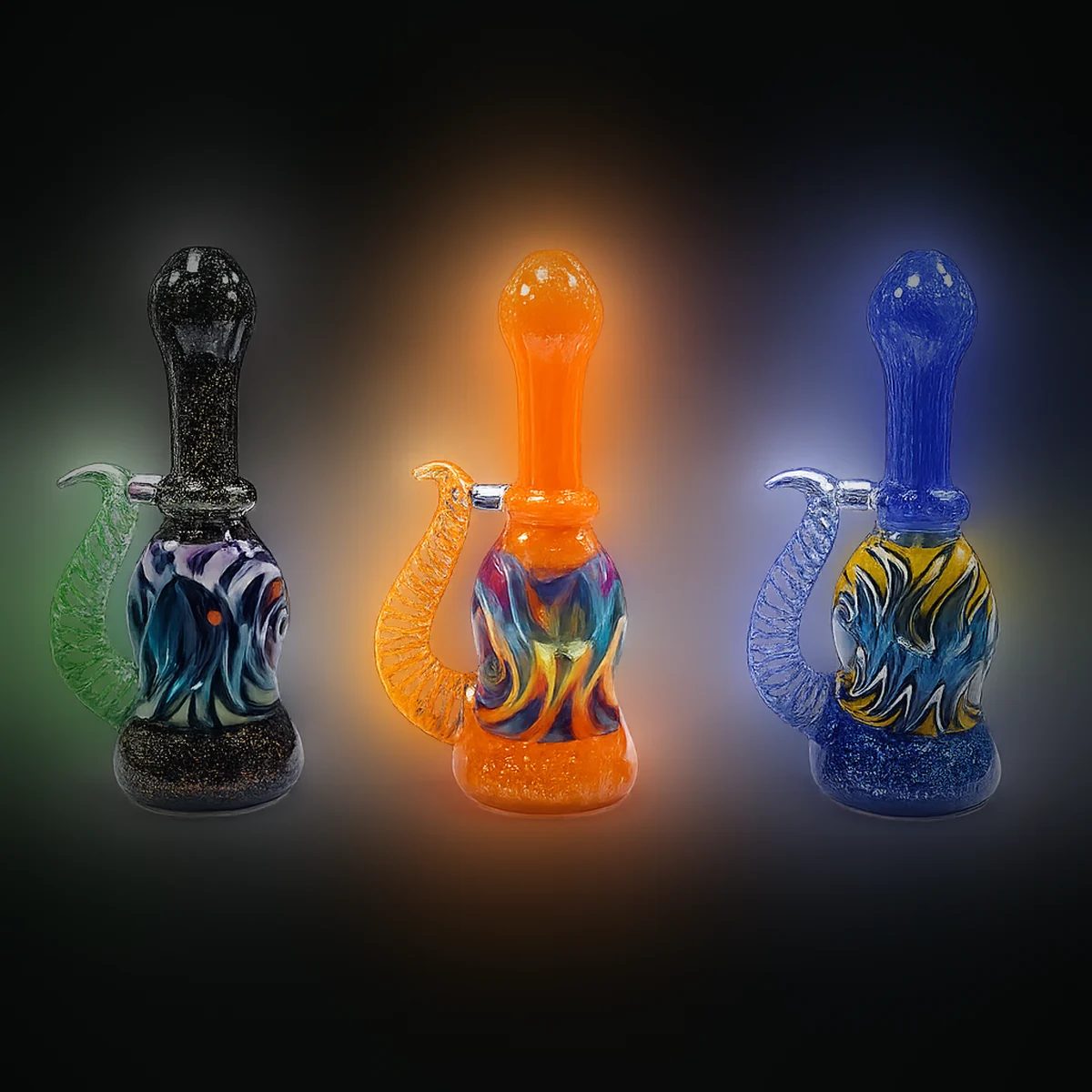 Chroma Flame, three hand-blown glass pipes in black, orange and blue