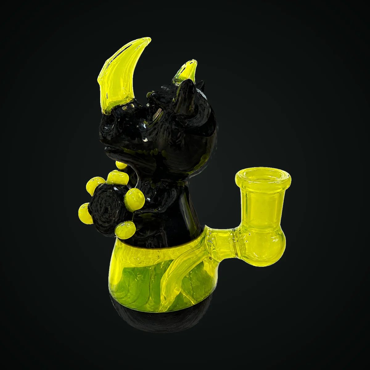 Rhino, a hand-blown black and yellow horned glass concentrate rig